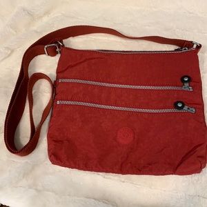 Kipling cross body vinyl bag